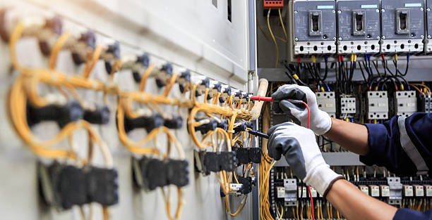 Professional Electrician technician working in Madison, AL